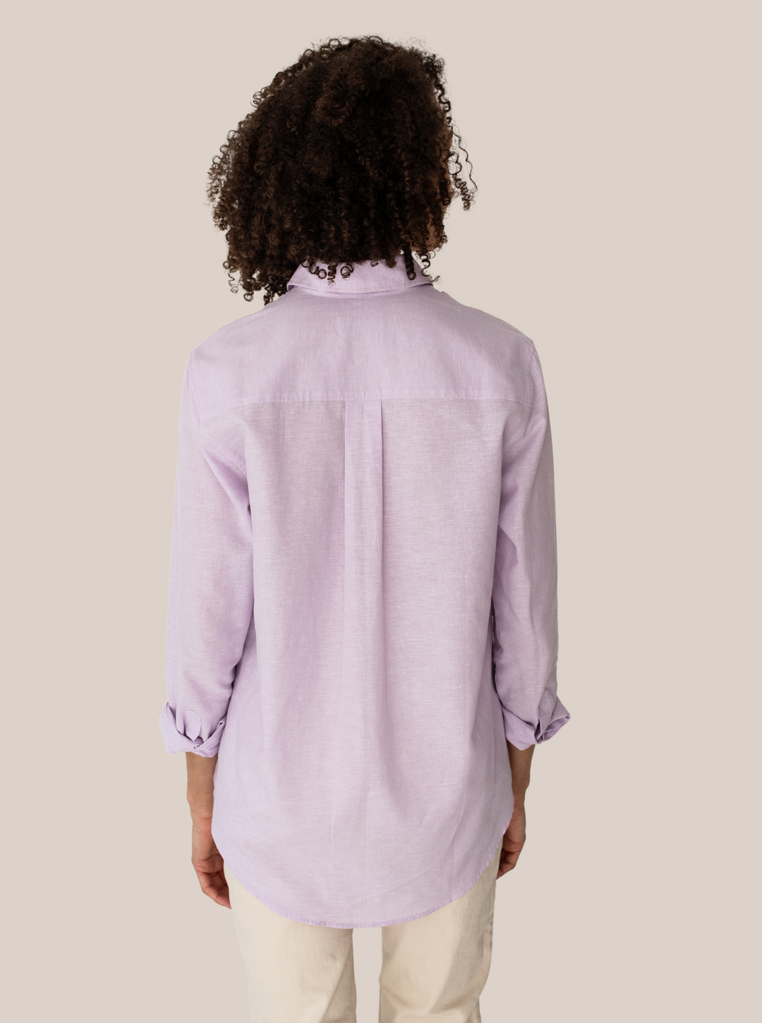 model with lilac blouse from the back